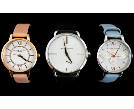 Three Fashion Watches To Include Michael Kors And Olivia Burton Three contemporary watches, the first a Michael Kors silver t