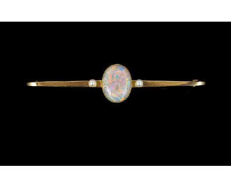 Antique Period - Excellent 15ct Gold Brooch, Set with Cabochon Cut Opal to Centre, The Oval Shaped Opal of Multi-Colours. Mar