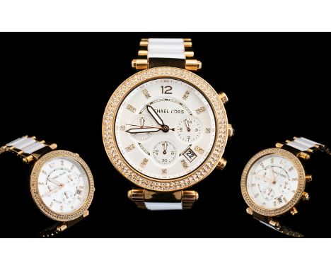 Michael Kors Ladies' Parker Chronograph Watch MK5774 From the Parker Collection by Michael Kors. Made from PVD rose-plated st