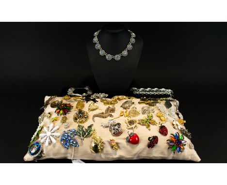 A Large Collection Of Vintage Costume Jewellery Brooches A varied collection of over 50 brooches to include several 1950's pa