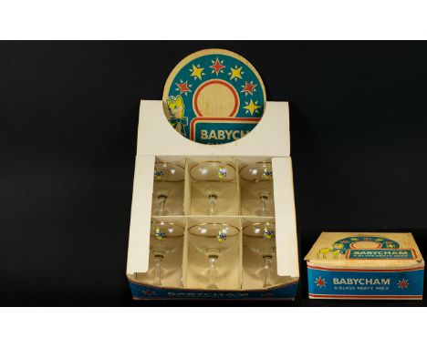A Boxed Set Of Original 1970's Babycham Glasses Six gilt trim small perry saucers with faun logo to bowl. Housed in original 
