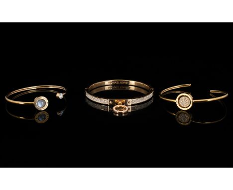 Michael Kors Collection Of Rose Gold Tone Bangles Three in total, each in as new, unworn condition. To include slim open bang