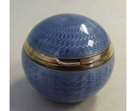 An early 20thC silver pill box of spherical form, allover decorated with engine turned purple enamel  Erich Kellerman  bears 