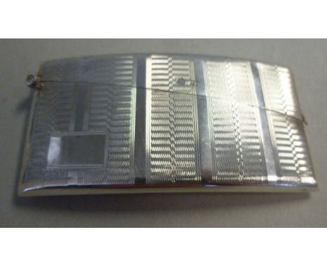 A silver card case of curved design, the hinged body with engine turned decoration  MH Meyer  Birmingham 1931