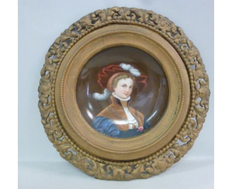 A late 19thC Continental porcelain bowl, decorated with a head and shoulders portrait, a young girl wearing a red hat, a ruff