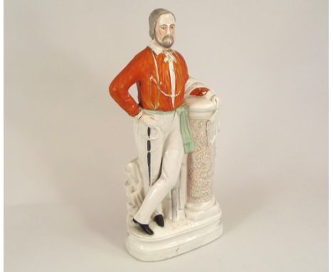 STAFFORDSHIRE FIGURE.A large, late 19th century Staffordshire pottery portrait figure of Garibaldi, with gilt script naming. 