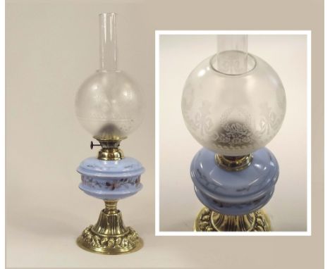 OIL LAMP. A 19th century oil lamp with painted opaque blue glass fount, Height 49cm. PLEASE NOTE: Our in-house, postal shippi