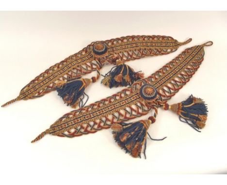TIE BACKS. A good pair of Victorian tasselled tie backs. Length 95cm.