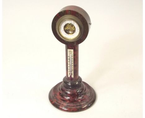 SERPENTINE. A red Cornish serpentine barometer/thermometer. Height 24cm.