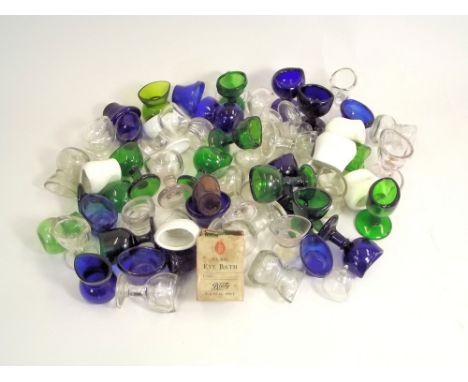 EYE BATHS. Approx. 57 ceramic &amp; glass eye baths.