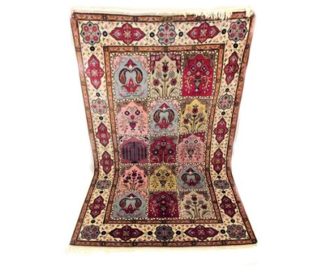 LARGE MIDDLE EASTERN CARPET. A Middle Eastern, finely knotted carpet. 181 x 285cm. PLEASE NOTE: Our in-house, postal shipping