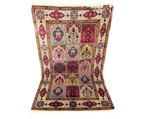 LARGE MIDDLE EASTERN CARPET. A Middle Eastern, finely knotted carpet. 181 x 285cm. PLEASE NOTE: Our in-house, postal shipping