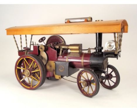 BURRELL MODEL STEAM ENGINE. A good scale model of a Burrell agricultural steam traction engine. With modifications for power 