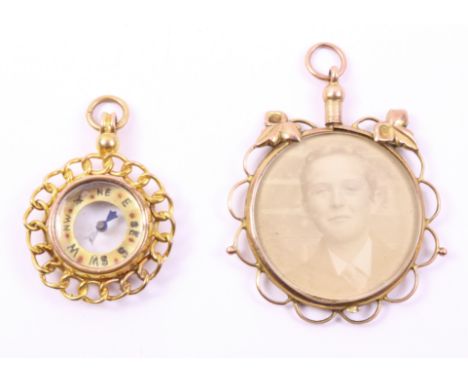 Edwardian gold fob compass hallmarked 9ct & a gold photo pendant stamped 9ct (2)   Condition Report   Click here for further 