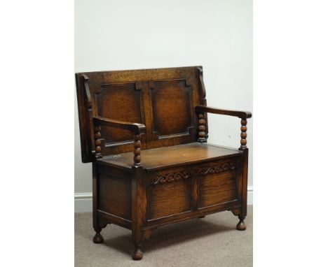 Early 20th century medium oak monks bench, hinged seat, bobbin turned supports, W92cm   Condition Report   Click here for fur