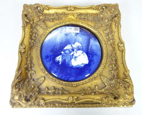 Blue and white convex ceramic plaque in ornate gilt frame 29cm x 29cm    Condition Report   Click here for further images, co