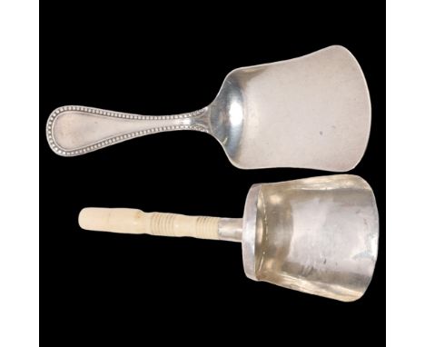 A George IV silver bone-handled shovel tea caddy spoon, possibly Joseph Taylor, Birmingham 1824, 8.5cm, and another silver be