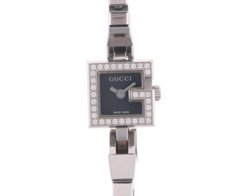 GUCCI - a lady's stainless steel and diamond Mini G quartz bracelet watch, ref. 102, black dial with pencil hands and diamond