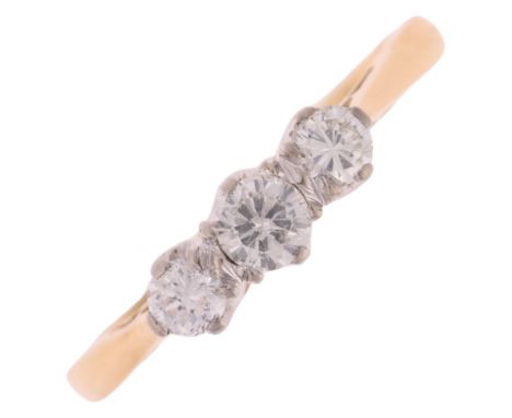 An 18ct gold three stone diamond ring, claw set with modern round brilliant-cut diamonds, total diamond content approx 0.35ct