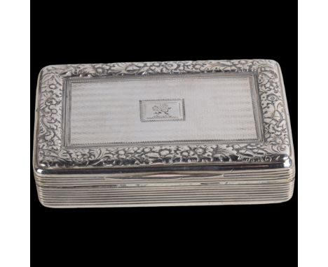 A William IV silver snuffbox, Thomas Edwards, London 1831, rectangular form, with engine turned decoration, relief floral bor