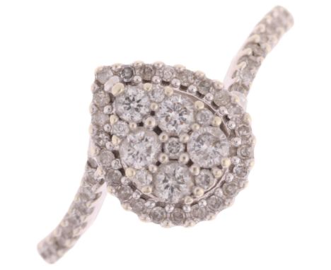 A 9ct white gold diamond pear halo cluster ring, pave set with modern round brilliant-cut diamonds, total diamond content app