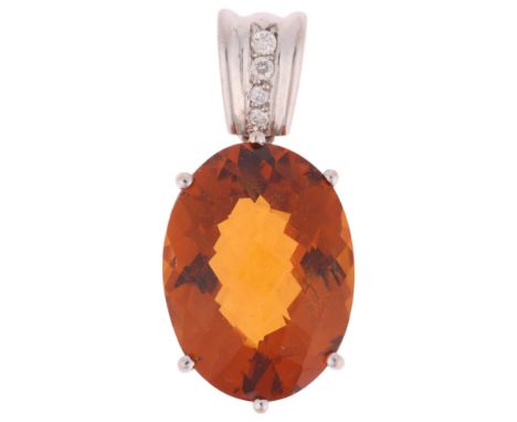 A modern 18ct white gold citrine and diamond drop pendant, set with oval rose-cut citrine and modern round brilliant-cut diam