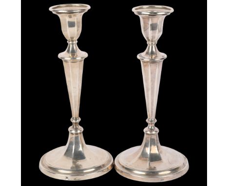 A pair of Edwardian silver table candlesticks, Fordham & Faulkner, Sheffield 1905, 21cm, loaded bases . Condition Report:Gene