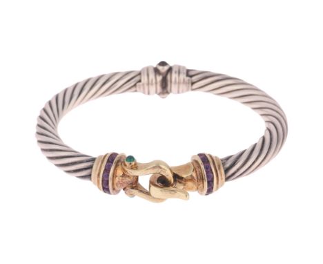 DAVID YURMAN (NEW YORK) - an American sterling silver and 14ct gold gem set hinged bangle, the twisted bangle set with caboch