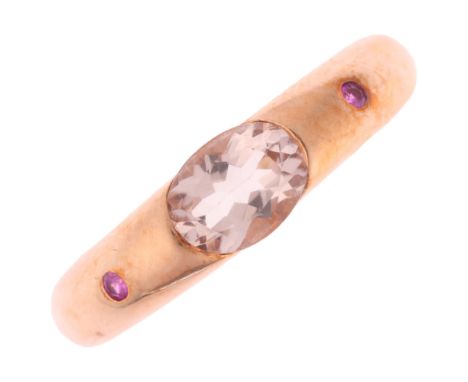 A 9ct rose gold morganite and ruby band ring, set with oval mixed-cut morganite and round-cut rubies, setting height 4.9mm, s