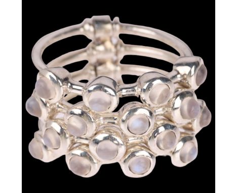 A sterling silver moonstone harem ring, comprising 4 individual bands set with round cabochon moonstones, setting height 13.8