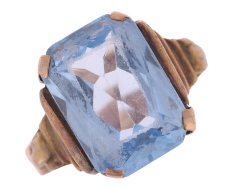 A 14ct gold blue synthetic spinel ring, setting height 12.6mm, size L, 2.9g . Condition Report:Facet edges are heavily abrade