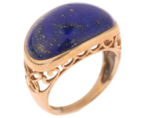 A 9ct gold lapis lazuli bombe ring, setting height 13mm, size K, 4.8g . Condition Report:No damage or repair, full UK hallmar