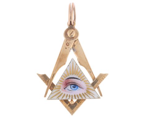 An Antique 9ct gold enamel Masonic eye pendant, hand painted and gilded enamel panel, apparently unmarked and tests as 9ct, 3