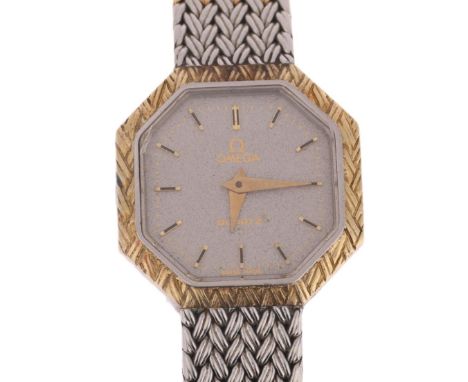 OMEGA - a lady's bi-metal quartz bracelet watch, ref. 591.0011, silvered dial with applied gilt baton hour markers, dauphine 