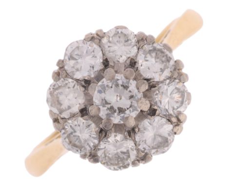 An 18ct gold diamond flowerhead cluster ring, platinum-topped set with modern round brilliant-cut diamonds, total diamond con