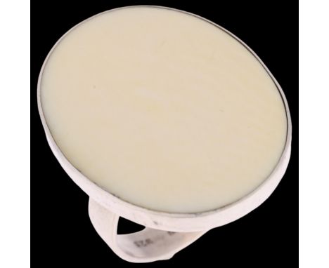 CORONA JEWELLERY - a Danish modernist sterling silver marine ivory panel ring, setting height 30.1mm, size N, 8.4g . Conditio