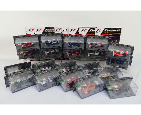 Eaglemoss - Formula 1. A selection of Twenty boxed 1/43 scale diecast F1 vehicles appearing in Excellent to NM condition, hou