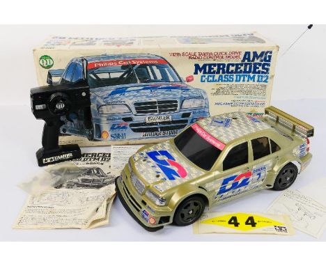 Tamiya - AMG Mercedes. A boxed Tamiya 1/12 scale #46019 AMG Mercedes C Class DTM D2 RC Car. 27.145MHz. Item appears to be in 