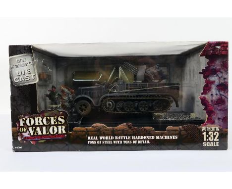 Forces of Valor - A boxed 1:32 scale Forces of Valor #80039 diecast WW2 German Sd.Kfz.Flakvierling 38. The model appears Mint