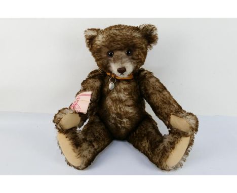 Steiff - A limited edition mohair Steiff bear named Happy. The replica '1926 Happy Anniversary' bear is jointed with stitched