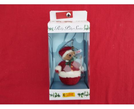 Steiff - Roly Poly Santa, issued in a limited edition of 5000 (No 04775), white tag to the ear, in Steiff Christmas window bo