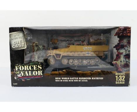 Forces of Valor - A boxed 1:32 scale Forces of Valor #81410 diecast WW2 German Sd.Kfz.251/1 Hanomag (Eastern Front 1944). The