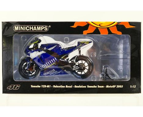 Minichamps - A boxed 1:12 scale Valentino Rossi Collection Yamaha YZR-M1 2005 Moto GP bike # 122053046. The model appears Min