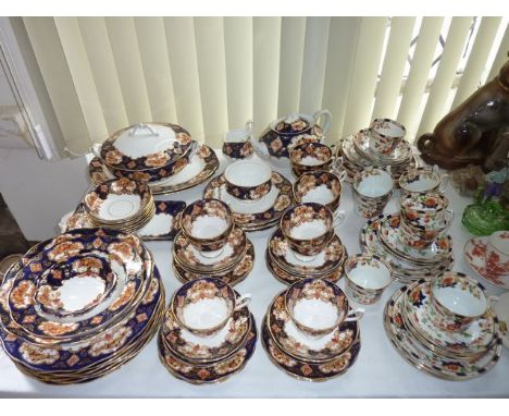 An extensive collection of Royal Albert Heirloom pattern dinner and tea wares with printed, infilled and gilded border decora