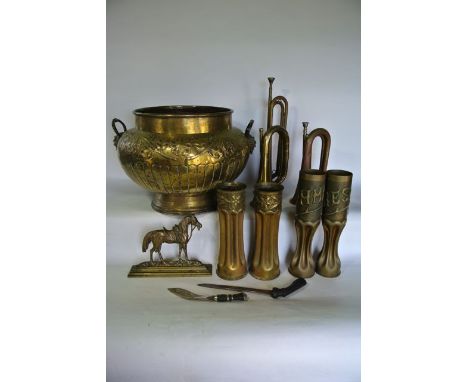 A substantial late 19th century brass  work jardinière/vessel of bulbous form with embossed foliate and other detail, 30 cm t