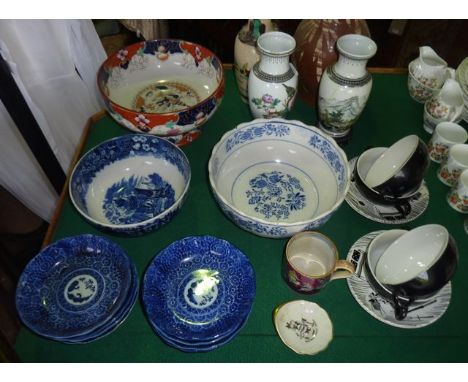 A collection of oriental and other ceramics including a matched pair of early 20th century vases, one with peony and bird dec