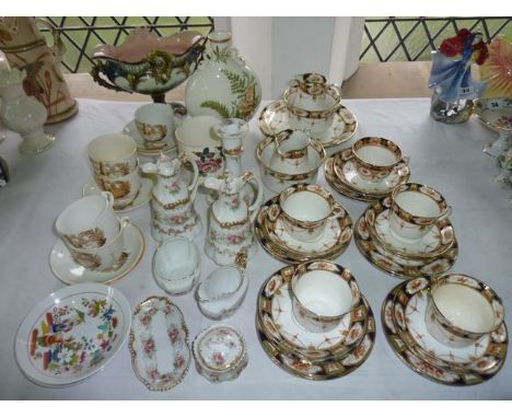 A collection of late 19th century Boronian pattern tea wares with printed and infilled border decoration including two milk j