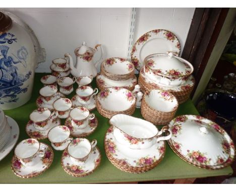 An extensive collection of Royal Albert Old Country Roses pattern dinner and coffee wares comprising a circular two handled t