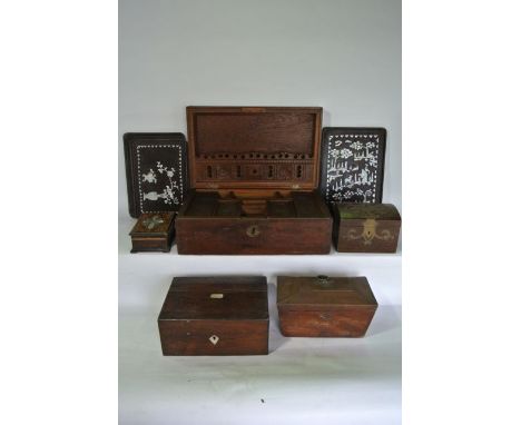 A large contemporary timber chest with hinged lid revealing a fitted interior with carved panelled decoration, a 19th century