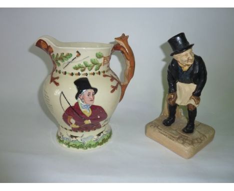 A Fieldings Crown Devon jug with relief moulded and painted decoration showing John Peel, with fox handle, various hunting mo